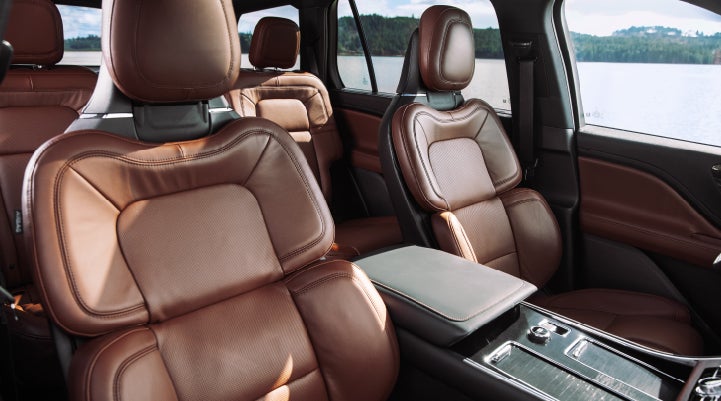 The front row's Perfect Position Seats in a 2024 Lincoln Aviator® Reserve model with Ebony Roast interior | Northgate Lincoln in Port Huron MI