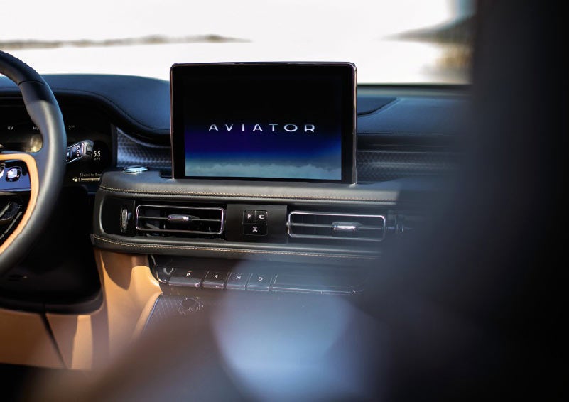 The welcome screen of a 2021 Lincoln Aviator Grand Touring is shown in the center screen