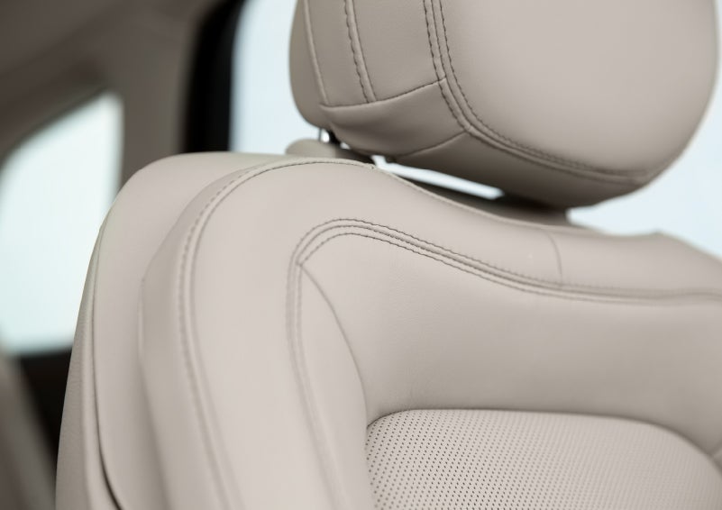 A detail shot of available leather-trimmed Perfect Position front seat shows off artistic details like luxe materials, precision stitching and supple curves | Northgate Lincoln in Port Huron MI