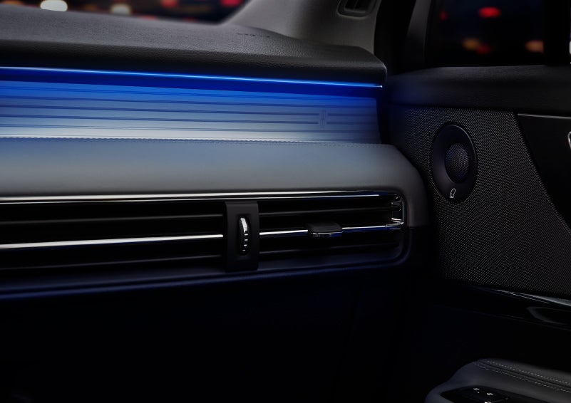 A thin available ambient blue lighting illuminates the pinstripe aluminum under an ebony dashboard, emitting a cool energy | Northgate Lincoln in Port Huron MI
