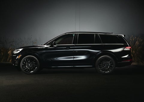 A 2024 Lincoln Aviator® SUV is shown in the Infinite Black exterior color | Northgate Lincoln in Port Huron MI