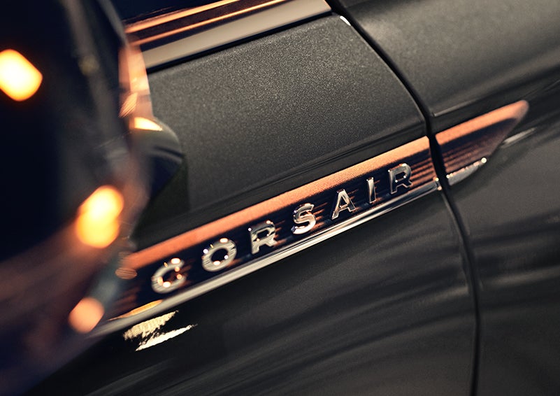 The stylish chrome badge reading “CORSAIR” is shown on the exterior of the vehicle. | Northgate Lincoln in Port Huron MI