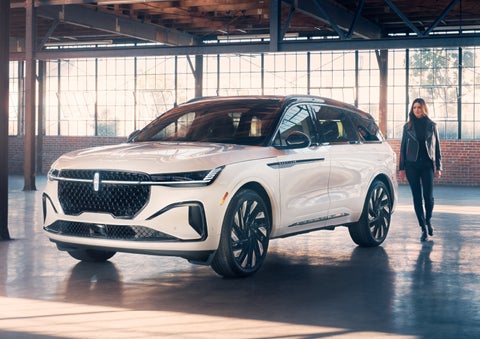 A person approaches a 2024 Lincoln Nautilus® SUV. | Northgate Lincoln in Port Huron MI