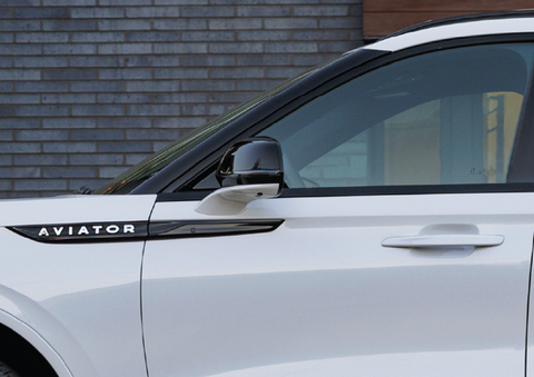 The driver’s door of a white 2025 Lincoln Aviator® SUV is showcased. | Northgate Lincoln in Port Huron MI