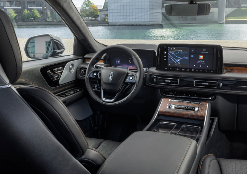 The interior of the 2025 Lincoln Aviator® SUV is shown parked with a view of a harbor through the windshield. | Northgate Lincoln in Port Huron MI