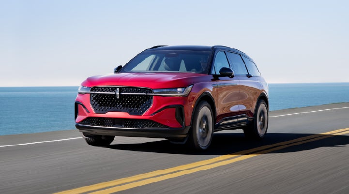 A 2025 Lincoln Nautilus® SUV is being driven on a seaside roadway. | Northgate Lincoln in Port Huron MI