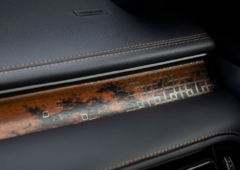 A close-up shot of the 2026 Lincoln Aviator® dashboard with unique black and brown accents and brown stitching. | Northgate Lincoln in Port Huron MI