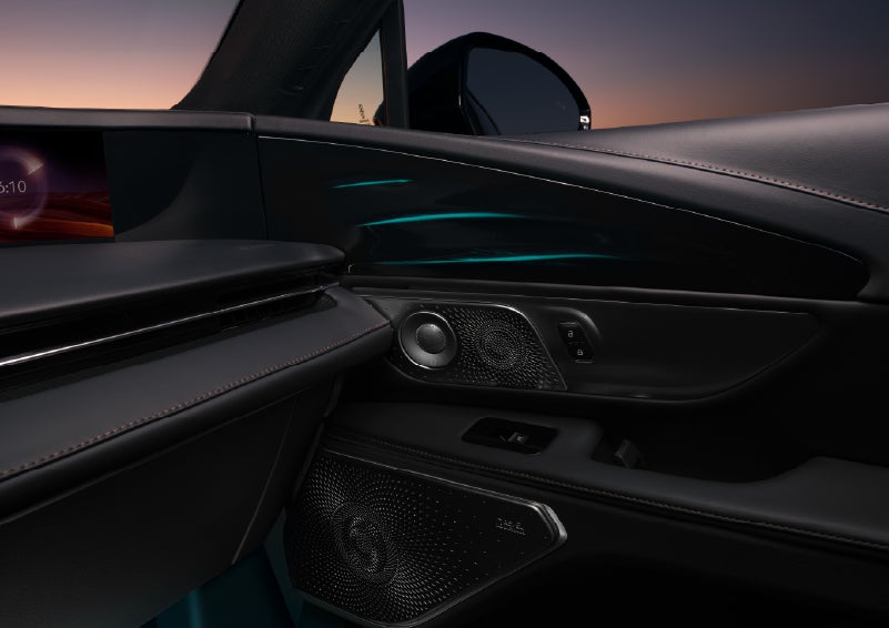 Selectable ambient lighting glows in the passenger door panel. | Northgate Lincoln in Port Huron MI