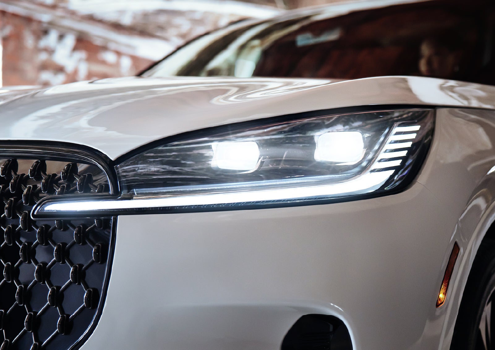 A close-up of a headlamp on the 2027 Lincoln Aviator® SUV is shown. | Northgate Lincoln in Port Huron MI