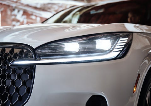 A close-up of a headlamp on the 2027 Lincoln Aviator® SUV is shown. | Northgate Lincoln in Port Huron MI