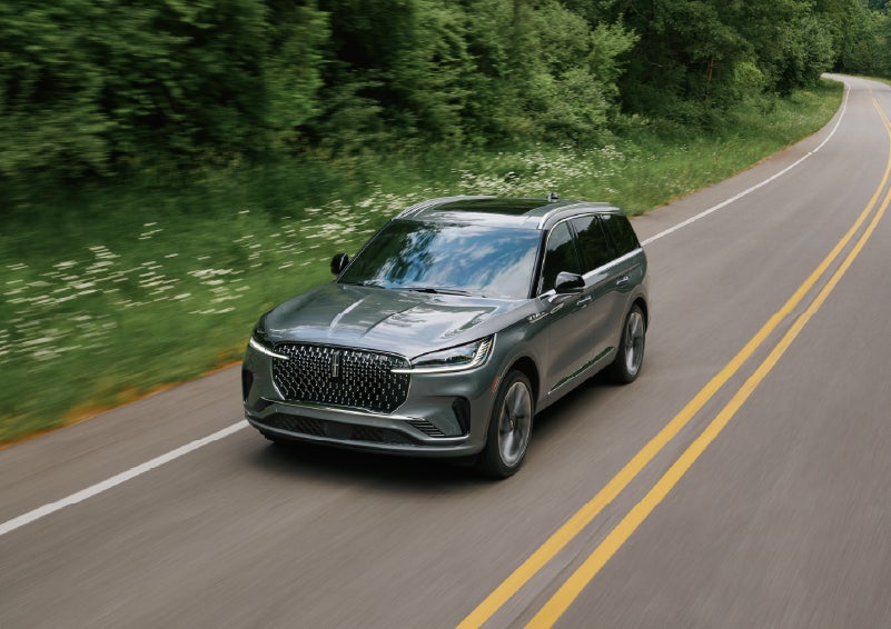 A 2027 Lincoln Aviator® SUV is being driven down a road. | Northgate Lincoln in Port Huron MI