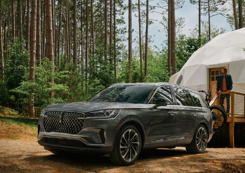 A 2027 Lincoln Aviator® is parked next to a high end glamping site. | Northgate Lincoln in Port Huron MI