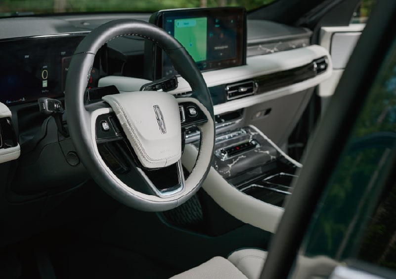 The leather-trimmed steering wheel of a 2027 Lincoln Aviator® Black Label™ SUV. | Northgate Lincoln in Port Huron MI
